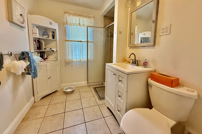 1 of 2 spacious bathrooms in unit - Bedroom 5 mins from campus with brand-new kitchen, spacious bathrooms and living room