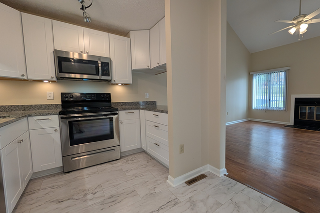 Kitchen - Main level master, single car garage, huge basement and yard Duplex