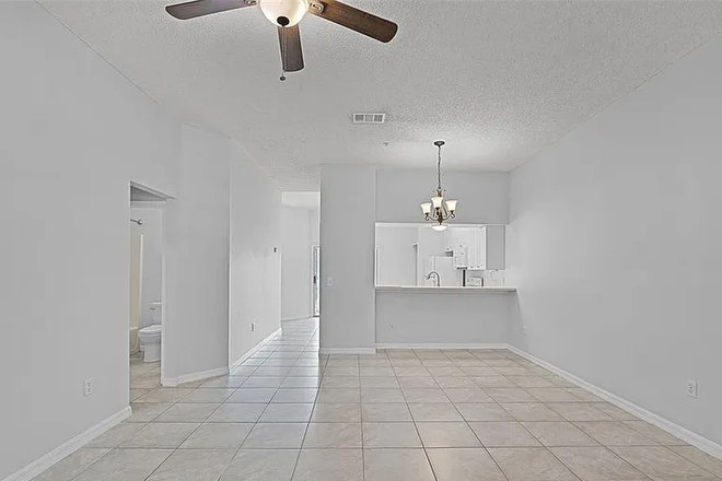 Living Room Area - Furnished Room with Bathroom in a 2 br. Condo.  2 minutes from UCF Beginning January 2026