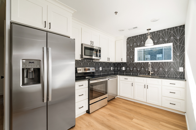 Kitchen - Grand Avenue Flat, new construction, walking distance to campus, and off street parking. Apartments