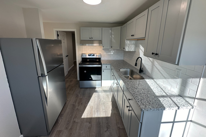 kitchen - Bedrooms Available for Spring Semester 2025 Apartments