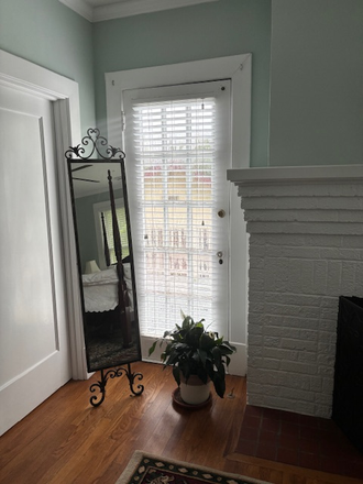 Another image of the bedroom.  The door to the left leads to private stairs to the third floor.  The other door to the deck. - Forest Park Multi-Room Suite - Walk to Campus House