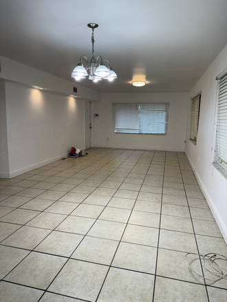 living room connected to kitchen - 4/3 house , only 5 blocks from Campus.