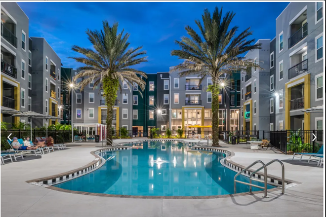Pool view from apartment - The Aves at 12100 Apartments