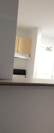 kitchen and front door of apartment - Mixed-Gender Apartment in South Campus Commons 3