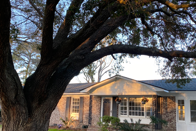 Large gracious oak in front to welcome you home - Beautiful home with character and space!  3 BR/2BA on James Island
