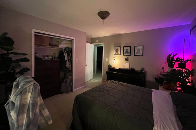 Bedroom from back corner - Upstairs room in a 2 unit house on the corner of Folsom & Mapleton Ave.