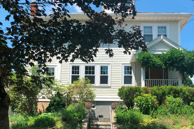 Street view of rental unit - 2 B/R-1 Ba & Sunroom.Quiet res. neighborhood w/EZ bus access & Avail. 1 car Off-Street Night Parking