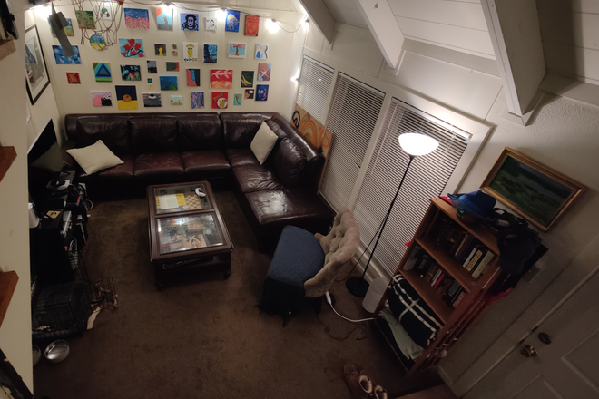 living room from stairs - Puffton Village Apartments