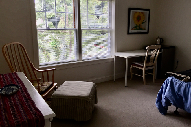 Bedroom with Large Double Window and armchair/ottoman - Large Furnished Cambridge Room for Rent: $1,300 a Month All included Close to Campus & Transit Townhome