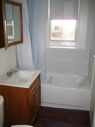 Hub Realty - Rare huge front facing 2 bedroom split with alcove, and renovated kitchen Apartments