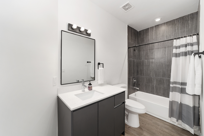 Private bathroom of The Surf bedroom - Rooms for rent in new townhouse (3/3.5); utilities & parking incl.! Next available term Aug. 2026!