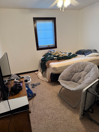 Bedroom that will be offered - Grunewaldt Properties LLC close to downtown Apartments