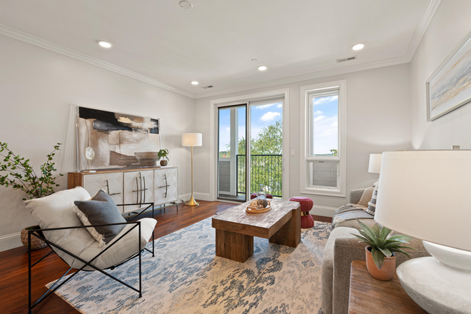 Livingroom w/ doors to patio - Luxury Elevator Building 2 bed, 2 bath Condo