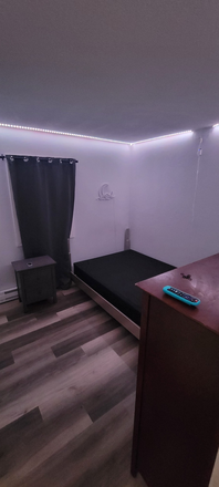 Bedroom Illuminated by Strip Lights - Apartment in Bruce Park