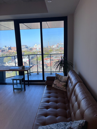 Living Room Area - Bright Downtown Toronto Condo Near UofT, OCAD & Hospitals