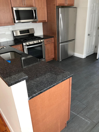 Kitchen - Beautiful 3-bed, 2-bath unit available 9/1/25! Apartments