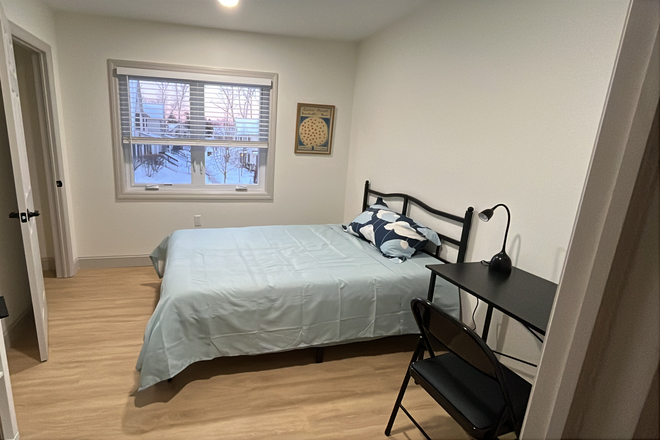 Bedroom furnished with a full size bed, desk, lamp, nifht stand, shelf & Ikea coat/bag hanger - Summer:Furnished room in shared home-John St-Princeton