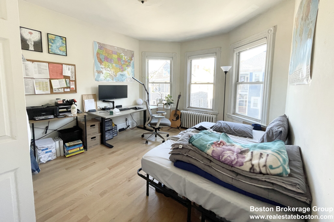 room - Large 4 Bedroom in Mission Hill! Stainless steel appliances and in-unit Laundry Apartments