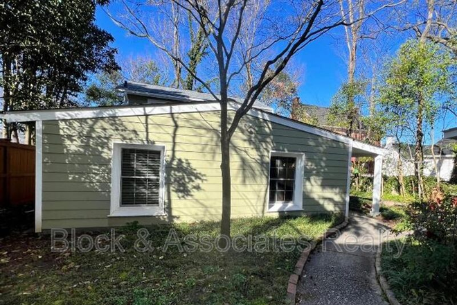 Exterior - walking into fenced semiprivate courtyard - Rare gem in heart of walkable Five Points, close to NC State & downtown Apartments