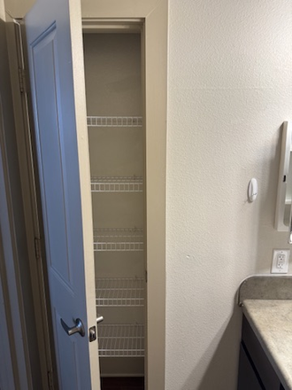 Bathroom Closet - 🔥 Lease Takeover – Spring 2026 | The Lofts at Wolf Pen Creek (Males Only) 🔥