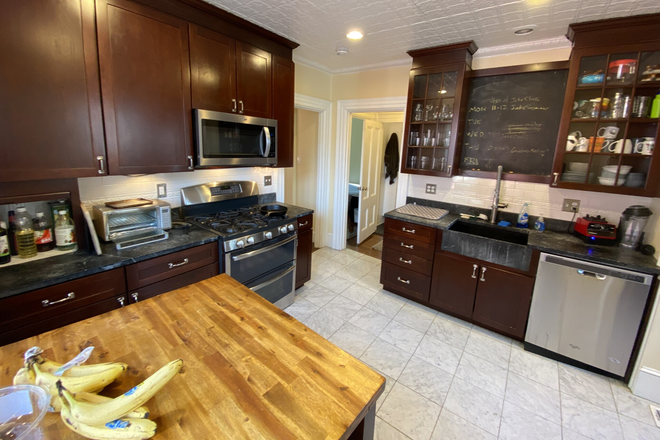 Kitchen - Modern 5 Bed/2 Bath Duplex Near Davis Square – Central AC & Private Deck!