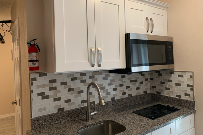 Kitchen - Private Fully Furnished Studio Apartments