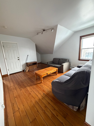Living Room - Spacious 3 Bedroom Apartment Close to Campus - Available Furnished!