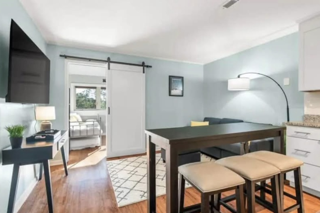 Living room/kitchen - Healthcare housing hotspot perfect for traveling nurses & med students! Apartments