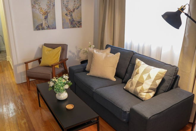 Living room - Cozy & Stylish 1-Bed Apartment in Coral Gables — Steps from Shops.
