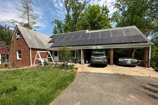 Large driveway and carport - Beautiful Home in Old Greenbelt with new deck and patio. 1 block from town center and bus.