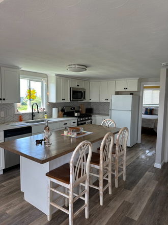 Kitchen facing (2) bedroom view.  Lots of light! - Academic Year 2025 2026 Beach View Furnished 2 Bedroom Cottage Outdoor shower, deck, patio! House