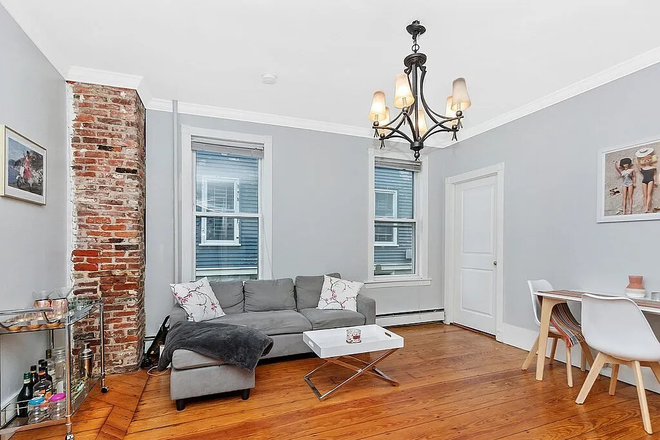 Living Area - 3 bedroom on Hillside St. with modern kitchen, laundry & private deck! Apartments