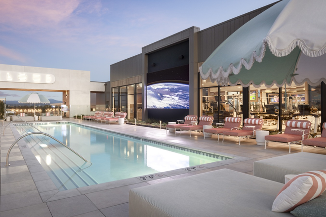 Rooftop Pool with Large Monitor - Cloud House Apartments