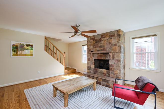 . - Gorgeous Brookland home with a gourmet kitchen, enormous backyard with patio, and fireplace