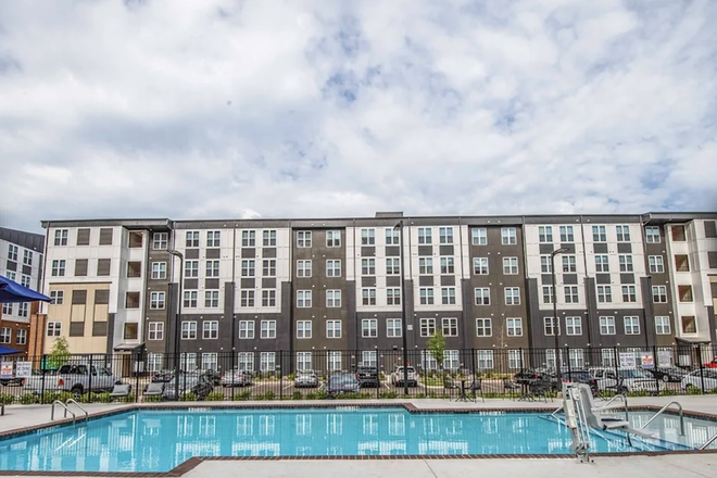 View of Flagship Kerns from the pool and outdoor area - Flagship Kerns