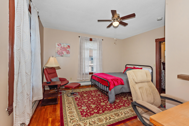 2nd floor Guest bedroom #1 walk-in closet desk, lounger chair, queen size bed, ceiling fan, code lock on door, view of Frog Bridge - Willi-Lily Pad - Private Room in a shared furnished apartment