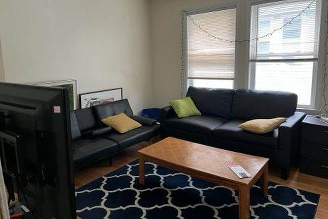 living room - No Broker Fee - Spacious Renovated 4BR Apartment – Walk to Tufts – June 2026