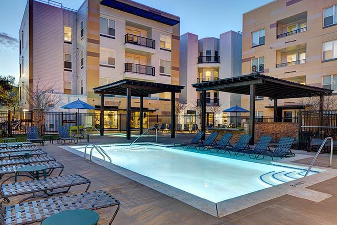 Outside and pool area - U Club on 28th Apartments