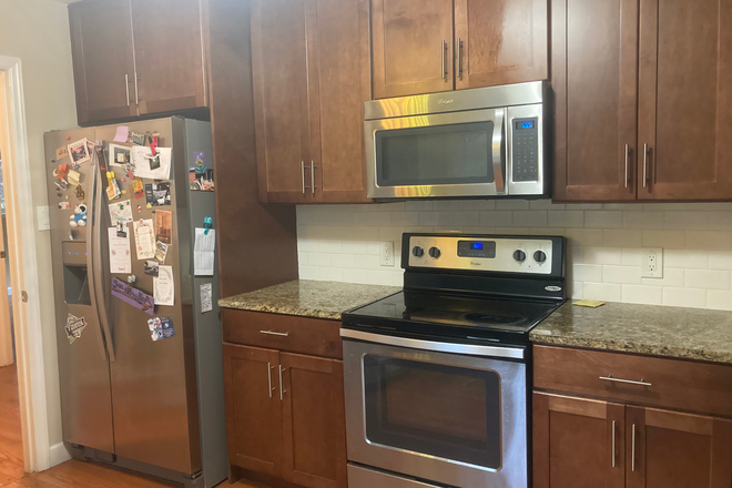 Kitchen has table with seating for 4 or more - 1/2 Block from East Campus 2 bedroom apartment to share