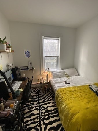 Bedroom - Renovated 3-Bed, 1.5-Bath Near Kendall Square with In-Unit Laundry Apartments