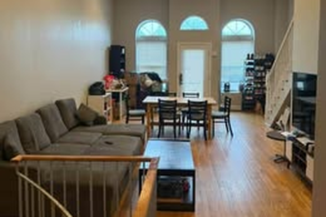 Living Room - Large Private Room 5–10 Min from UMass Boston | Parking Included Townhome