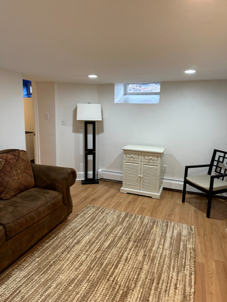 living room basement apartment - Beautiful basement apartment, private entrance, fully furnished, lots of light! No Broker's Fee