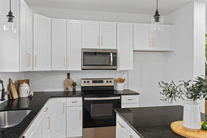 Kitchen - New 3BR/2.5BA Townhome Style Duplex — ~6 Min to Liberty | No Water Bill, Lawn Included
