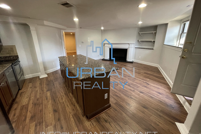 LIVING ROOM - RENOVATED 1 BED 1BATH ACROSS THE STREET FROM BC CAMPUS * AVAILABLE AUG 1, 2026* Apartments