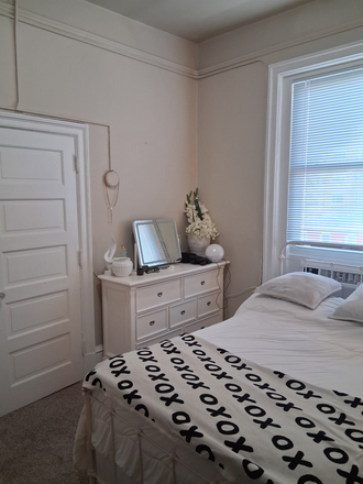 The bedroom and closet. - 1 BDR Effeciencey Apt, in the historic Chesterfield building, 1 block from everything