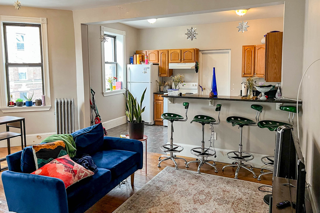 OPEN CONCEPT Living Room/Kitchen - 1066 Commonwealth Ave - Huge bedrooms, updated kitchen, seconds from Babcock T stop & Star Market! Apartments