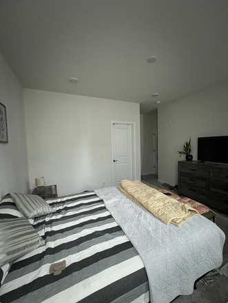 Master Bedroom with a King Size Bed - Furnished room-Parker Blvd-Princeton Junction Townhome