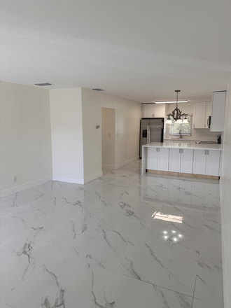 Living Room - 2 Bedroom / 2 Bathroom that's been recently renovated. Just a 7 minute drive to campus. Condo