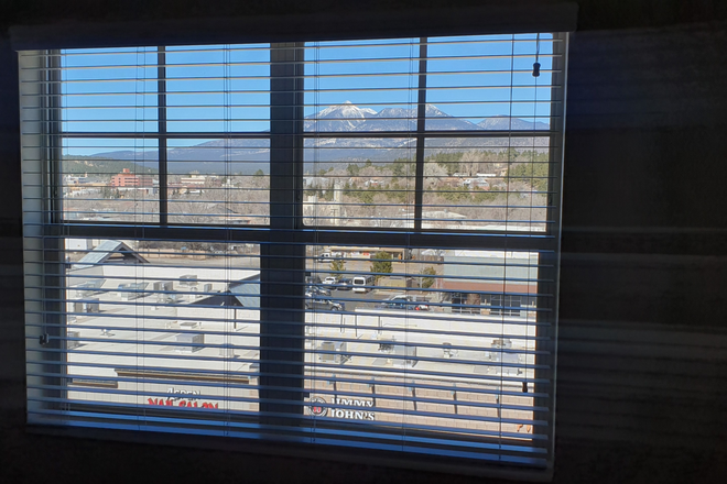 View from bedroom - En Suite, large bedroom with stunning views of San Francisco Peaks, close to NAU Apartments